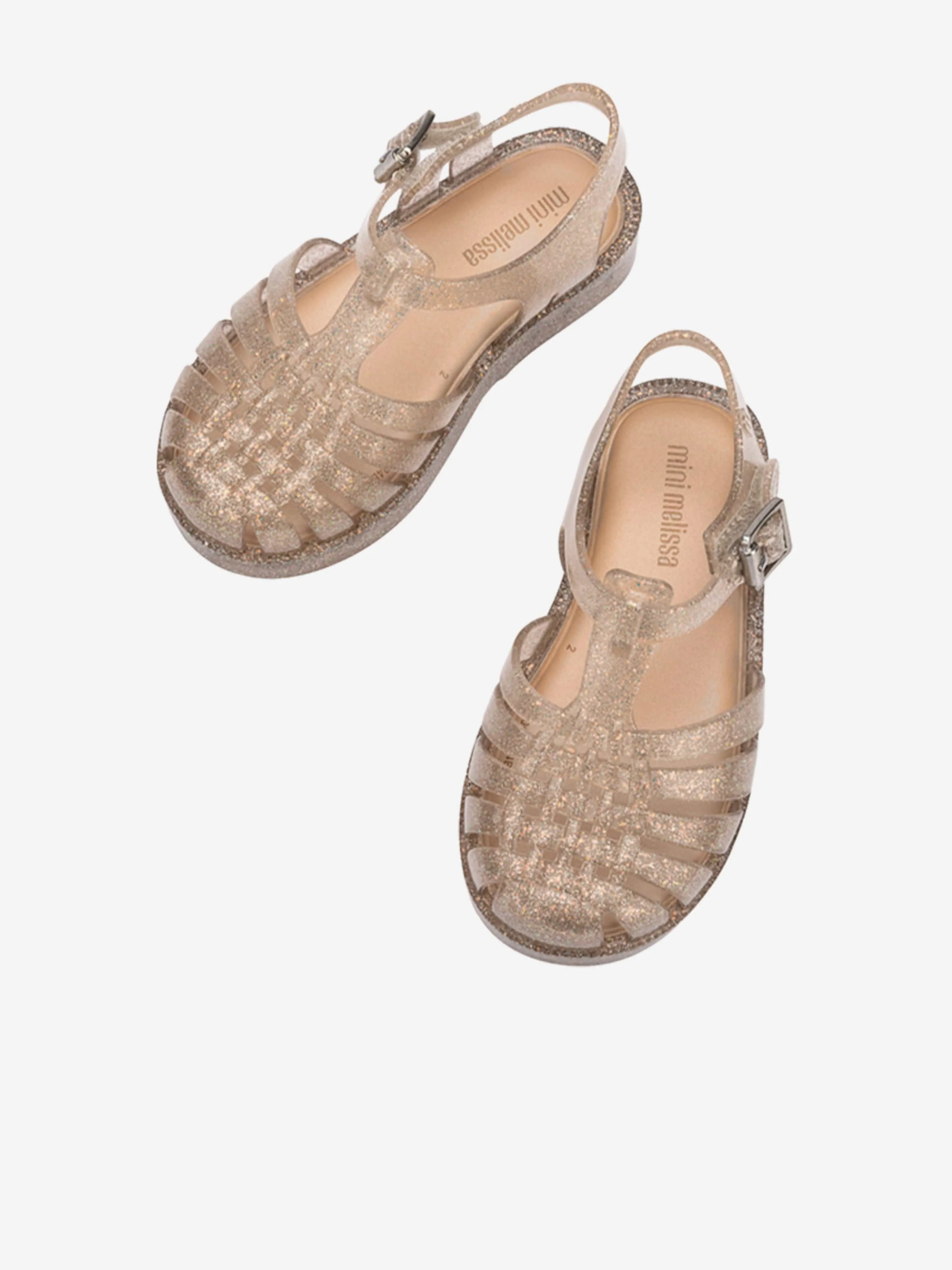 Mädchen Besitz Glänzende Sandalen in Gold