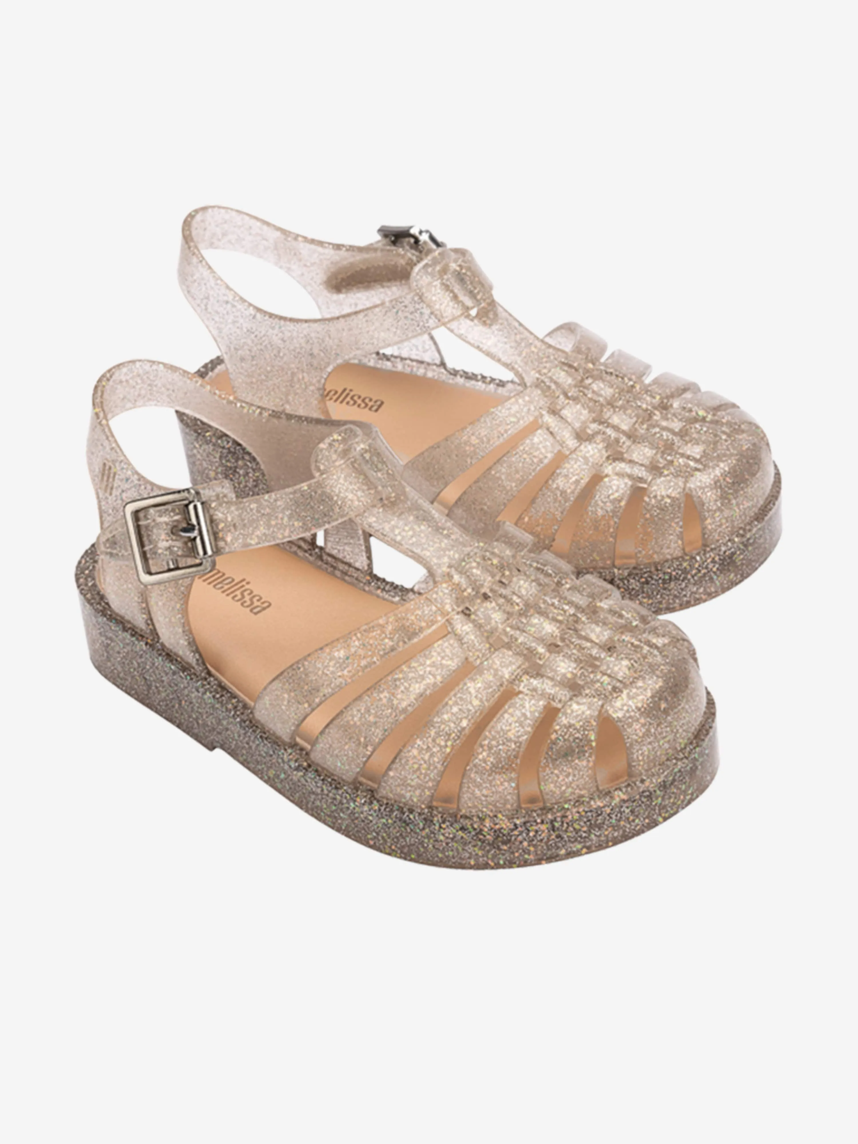 Mädchen Besitz Glänzende Sandalen in Gold